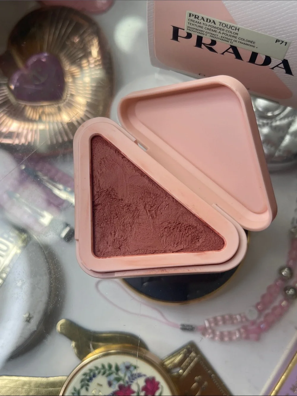 Prada touch cream to powder color blush in bow